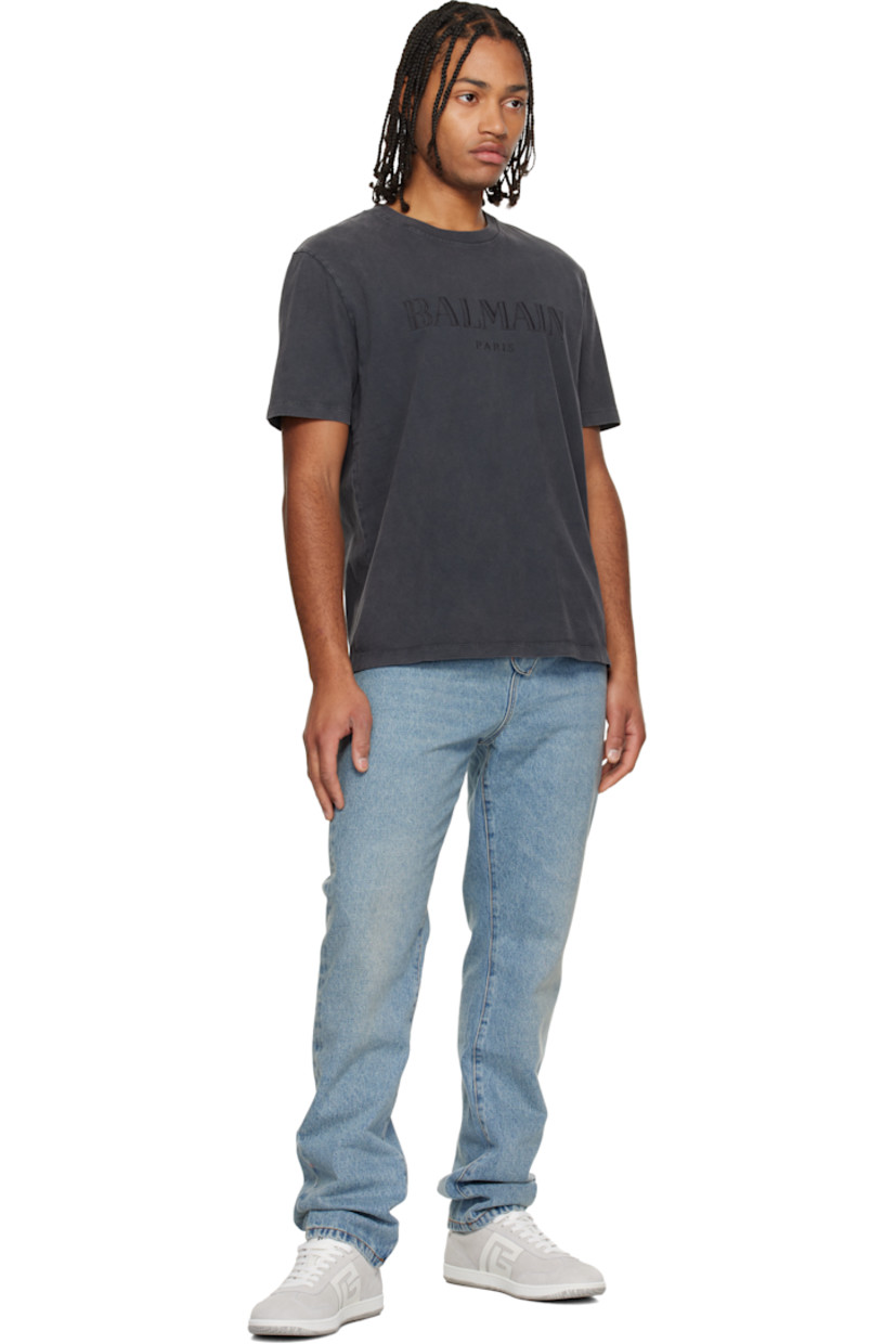 Low-top calfskin suede and cotton canvas sneakers.

· Serrated edges throughout
· Lace-up closure
· Logo embossed at padded tongue
· Padded collar
· Logo patch at sides
· Logo stamp at outer side and heel tab
· Buffed leather lining
· Treaded rubber sole

Supplier color: White