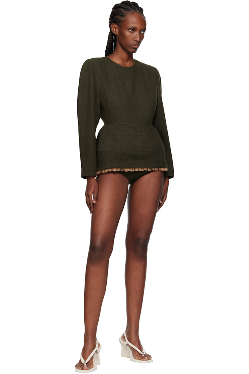 Wool-blend flannel minidress.

· Round neck
· Ruffled tulle trim and integrated briefs-style trim at hem
· Seam pockets
· Padded shoulders
· Zip closure and button closure at back
· Full satin lining

Supplier color: Kh