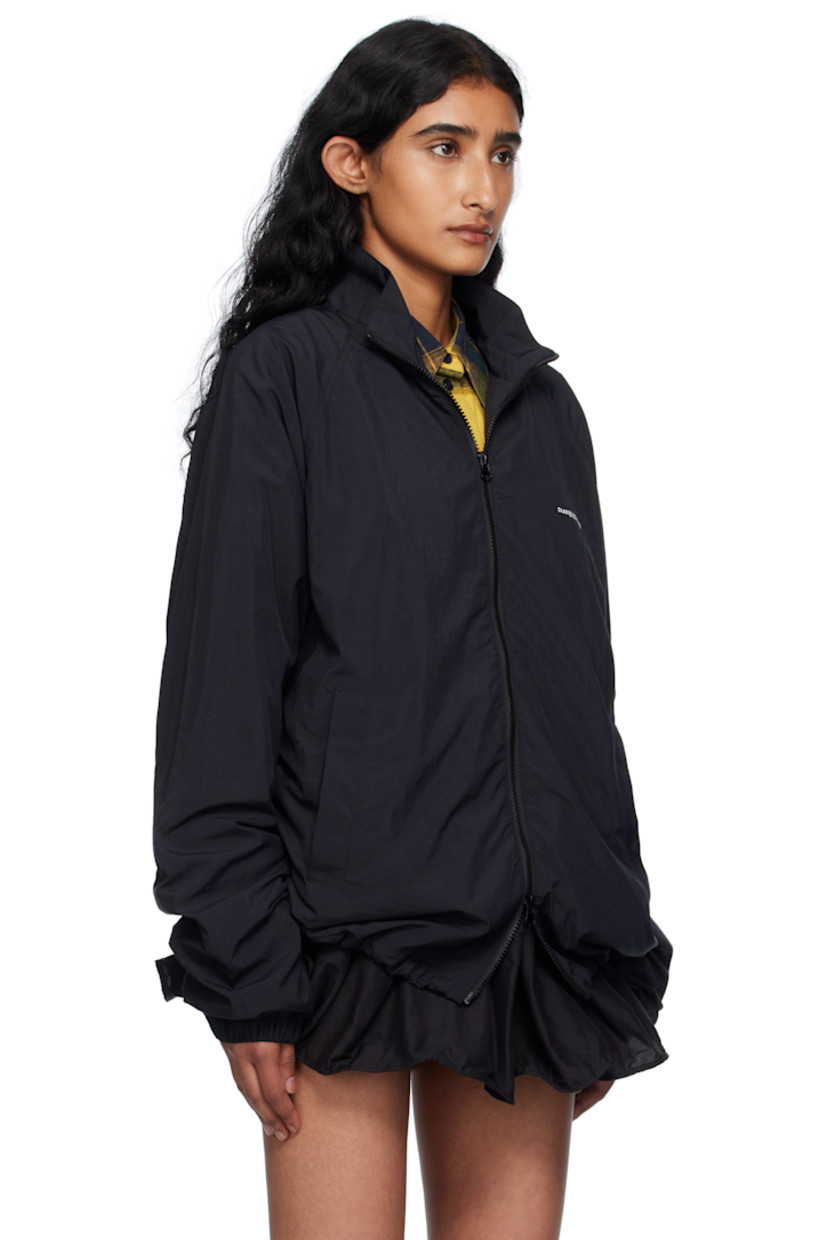 Nylon taffeta jacket.

· Stand collar
· Two-way zip closure
· Logo printed at chest and back
· Welt pockets at front
· Bungee-style drawstring at hem
· Metal eyelets at underarms
· Raglan sleeves
· Elasticized cuffs
· Full mesh lining

Supplier color: Bk