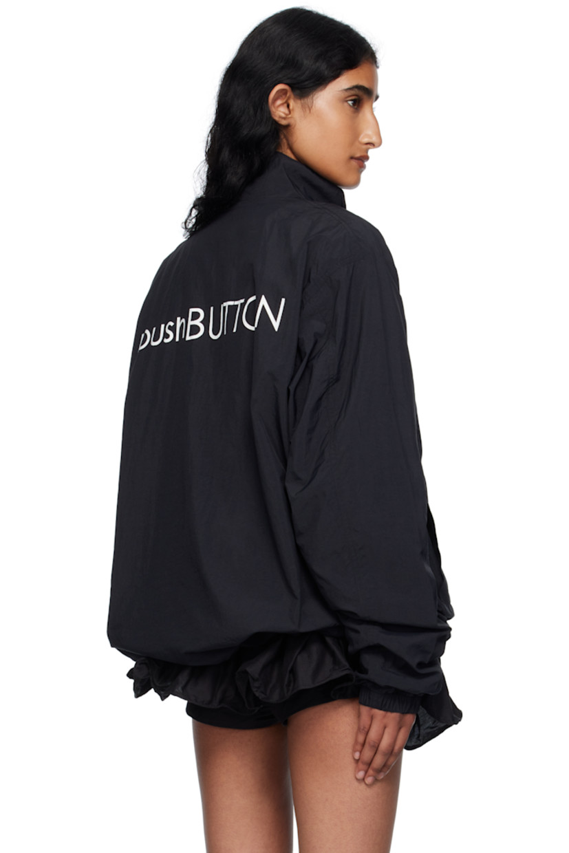 Nylon taffeta jacket.

· Stand collar
· Two-way zip closure
· Logo printed at chest and back
· Welt pockets at front
· Bungee-style drawstring at hem
· Metal eyelets at underarms
· Raglan sleeves
· Elasticized cuffs
· Full mesh lining

Supplier color: Bk
