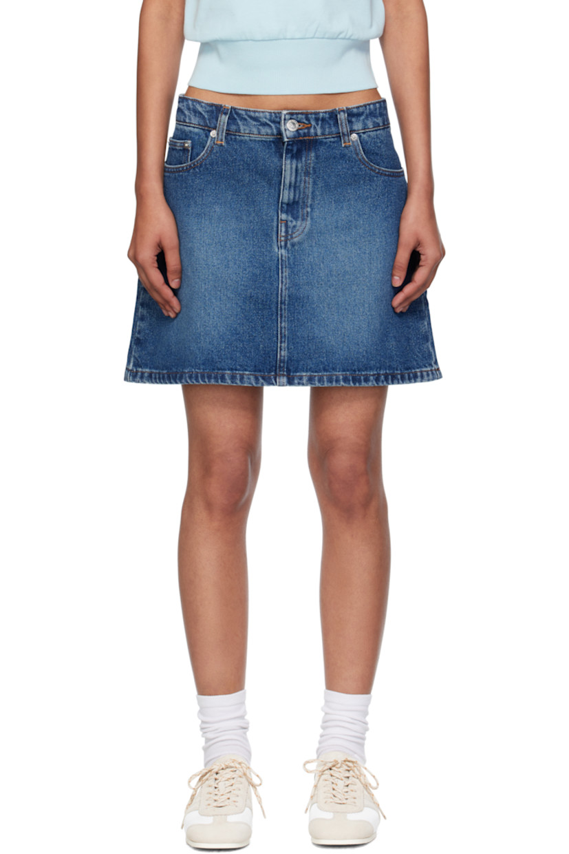 Non-stretch denim miniskirt.

· Fading throughout
· Belt loops
· Four-pocket styling
· Zip fly
· Contrast stitching in tan

Supplier color: Indigo