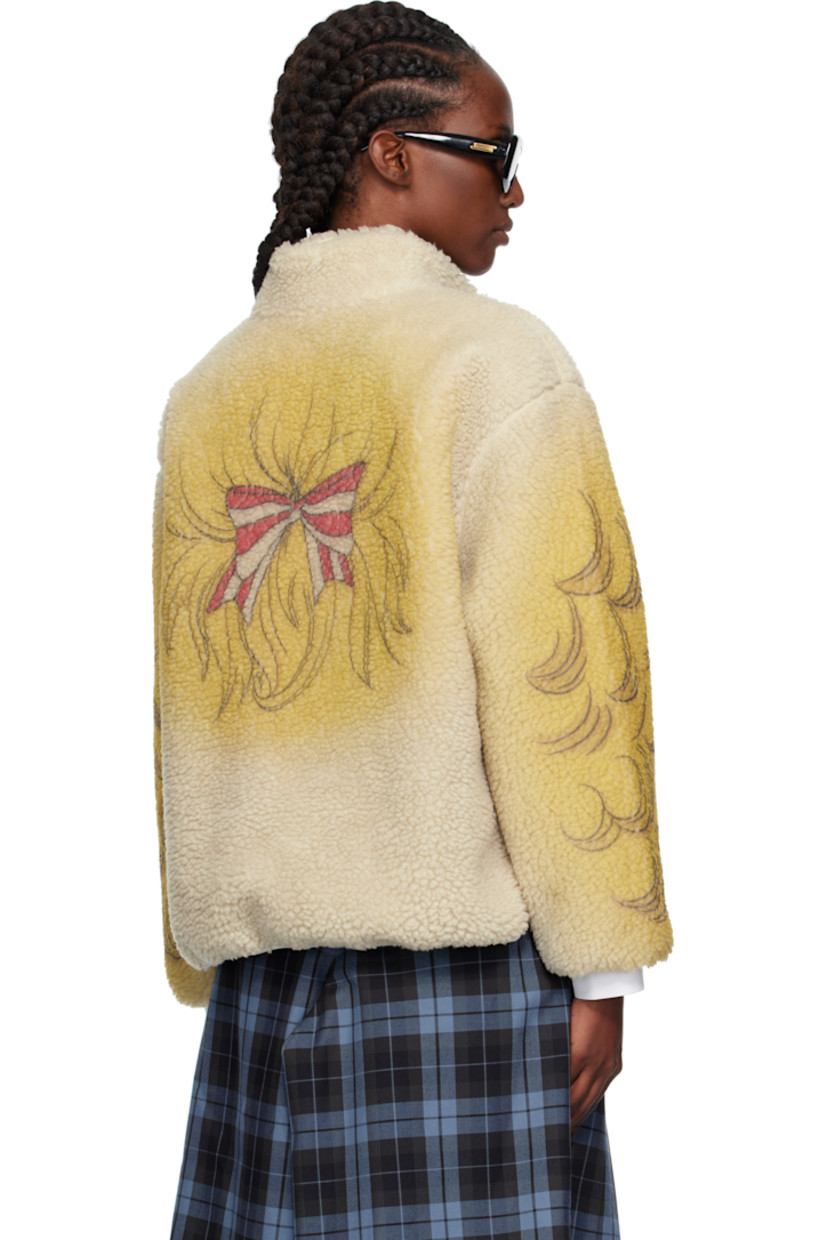 Sherpa fleece sweater.

· Stand collar
· Half-zip closure
· Graphic printed at front, sleeves, and back
· Zip pockets at front
· Elasticized hem and cuffs
· Full mesh lining

Supplier color: Lbg