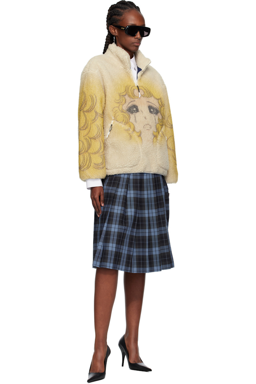 Sherpa fleece sweater.

· Stand collar
· Half-zip closure
· Graphic printed at front, sleeves, and back
· Zip pockets at front
· Elasticized hem and cuffs
· Full mesh lining

Supplier color: Lbg