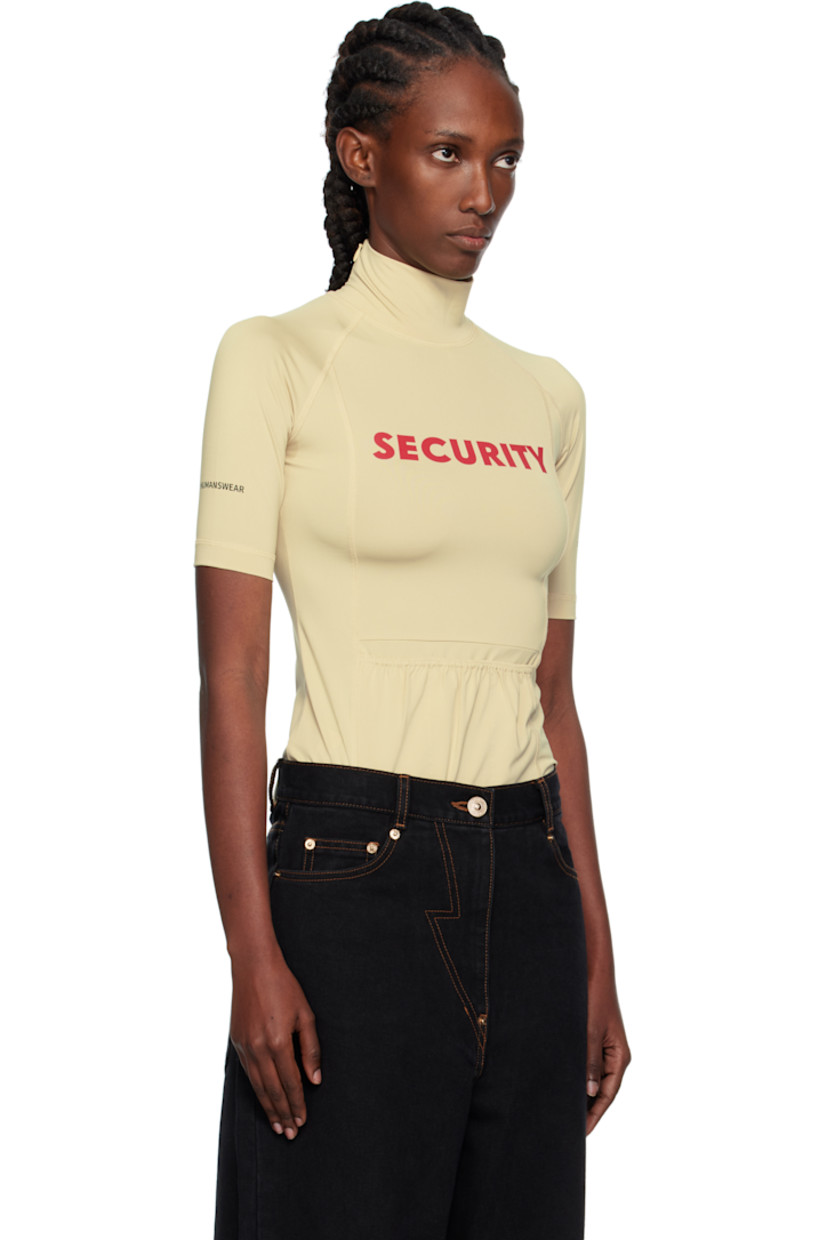 Stretch jersey top.

· Mock neck
· Text printed at chest and sleeve
· Patch pockets at front
· Raglan sleeves
· Zip closure at shoulder
· Logo printed at sleeve

Supplier color: Ye