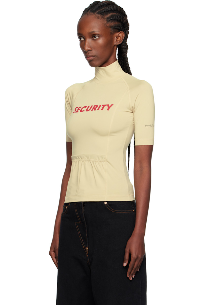 Stretch jersey top.

· Mock neck
· Text printed at chest and sleeve
· Patch pockets at front
· Raglan sleeves
· Zip closure at shoulder
· Logo printed at sleeve

Supplier color: Ye