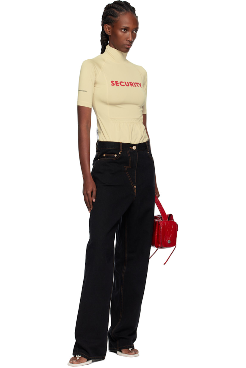 Stretch jersey top.

· Mock neck
· Text printed at chest and sleeve
· Patch pockets at front
· Raglan sleeves
· Zip closure at shoulder
· Logo printed at sleeve

Supplier color: Ye