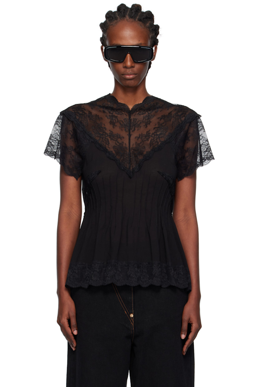 Semi-sheer modal-blend lace and chiffon top.

· Darts throughout
· Scalloped edge at V-neck, hem, and cuffs
· Button and zip closure at back

Supplier color: Bk