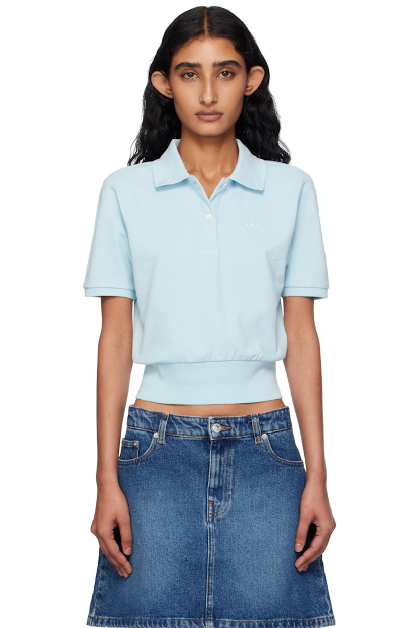 GOTS-certified organic cotton piqué polo.

· Rib-knit spread collar, hem, and cuffs
· Two-button placket
· Logo embroidered at chest
· Mother-of-pearl hardware

Supplier color: Light blue