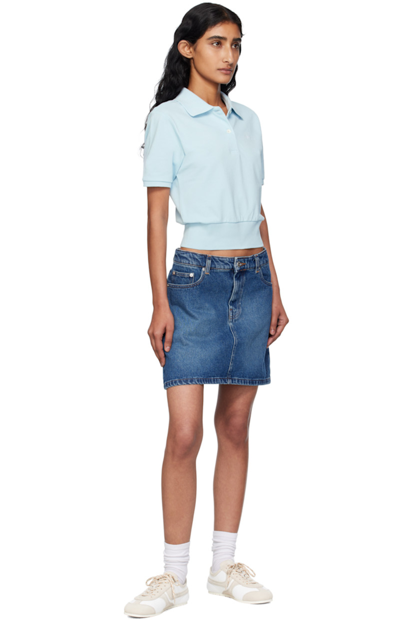 GOTS-certified organic cotton piqué polo.

· Rib-knit spread collar, hem, and cuffs
· Two-button placket
· Logo embroidered at chest
· Mother-of-pearl hardware

Supplier color: Light blue