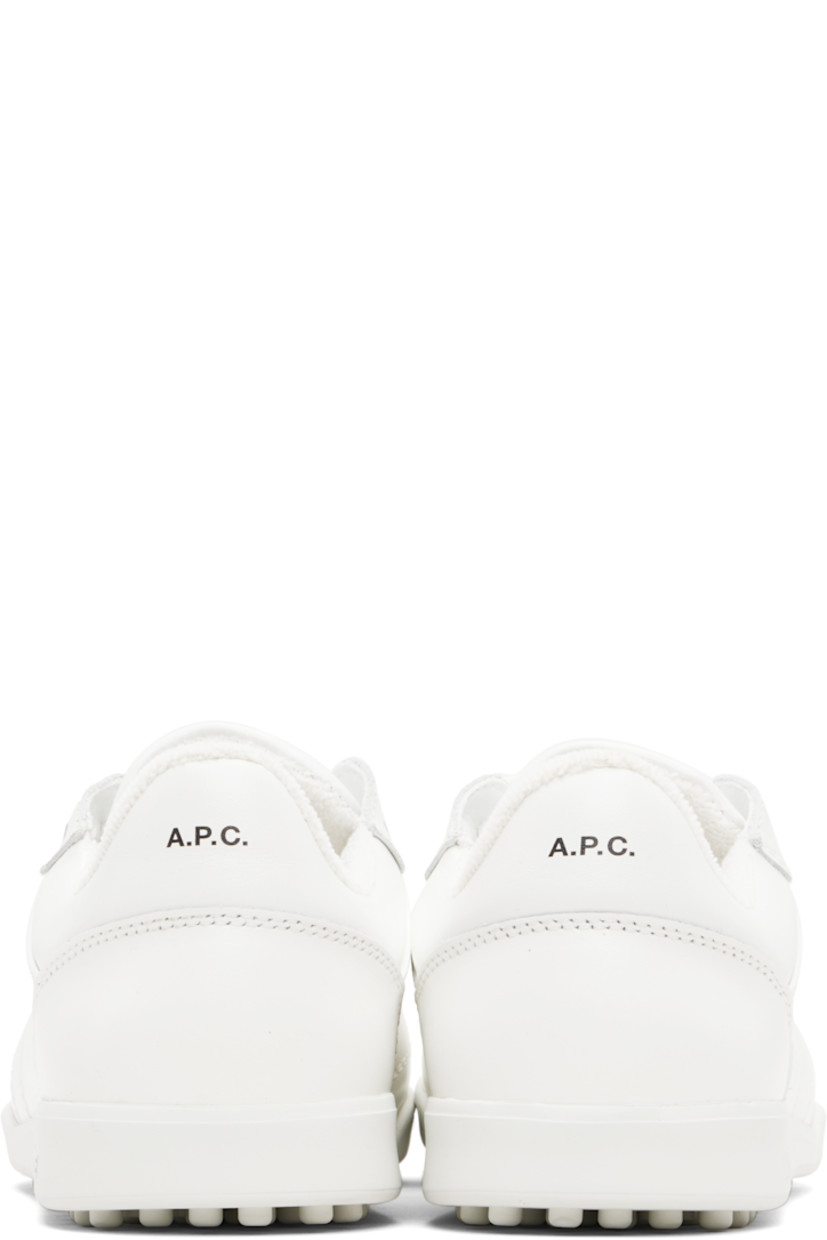 Low-top buffed leather sneakers.

· Topstitching throughout
· Lace-up closure
· Padded tongue and collar
· Logo stamp at heel tab
· Eyelets at inner side 
· Terrycloth lining
· Logo embossed at rubber midsole
· Treaded rubber sole

Supplier color: White