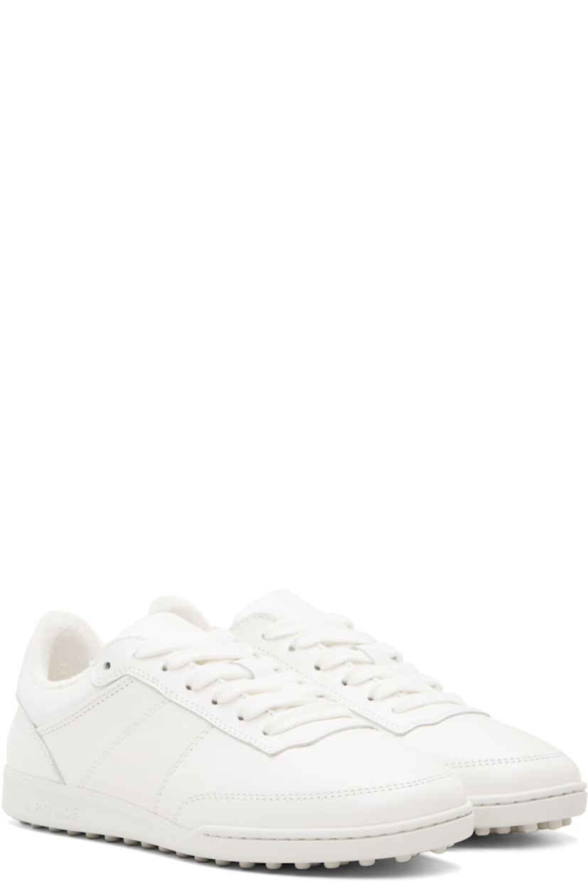 Low-top buffed leather sneakers.

· Topstitching throughout
· Lace-up closure
· Padded tongue and collar
· Logo stamp at heel tab
· Eyelets at inner side 
· Terrycloth lining
· Logo embossed at rubber midsole
· Treaded rubber sole

Supplier color: White