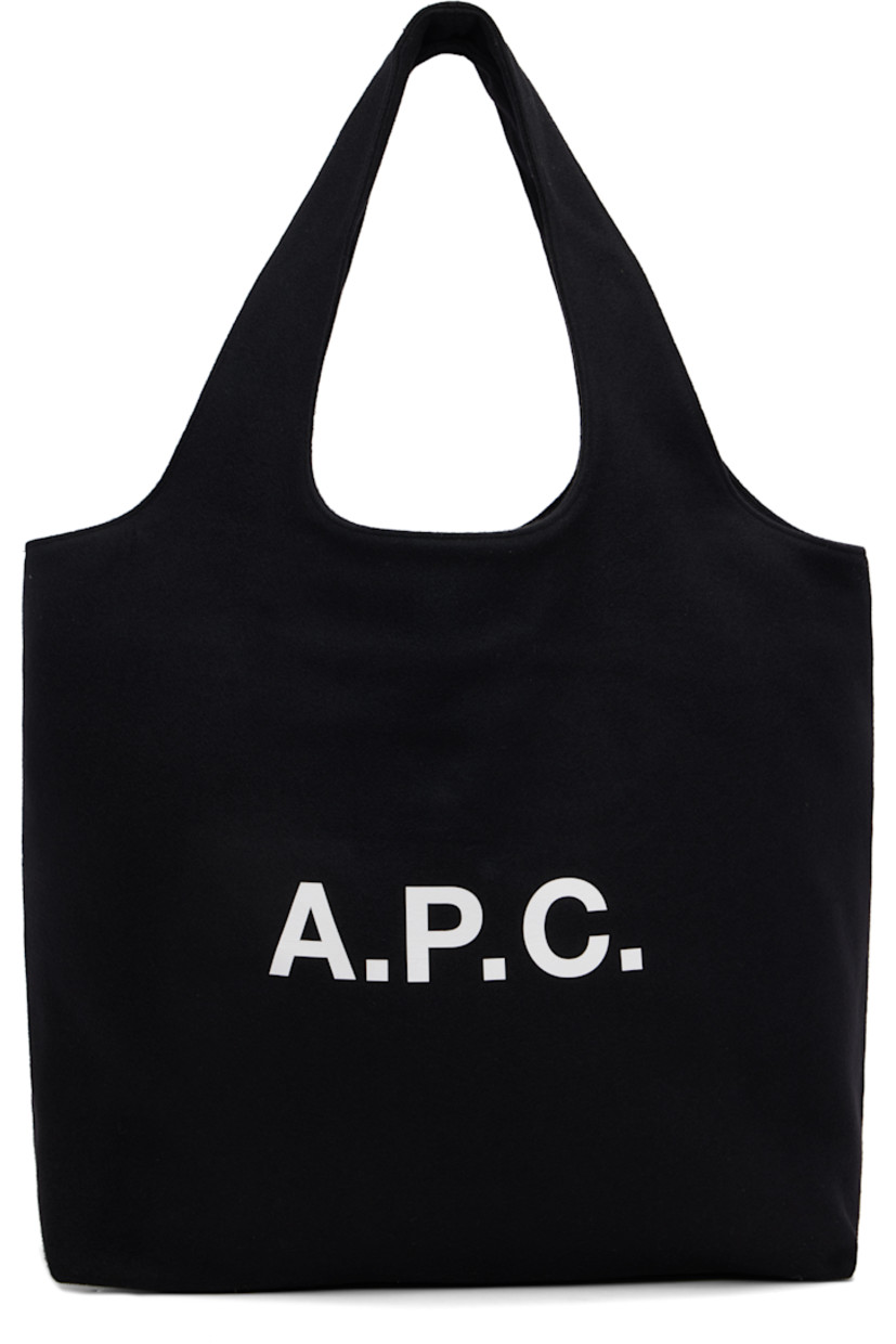 Felted tote.

· Integrated twin shoulder straps
· Logo printed at face
·� Open throat
· Patch pocket at interior 
· Twill lining
· H13.5" x W19" x D6"

Supplier color: Black