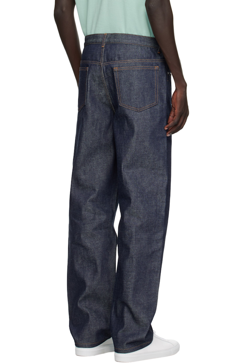 Non-stretch denim jeans.

· Fading throughout
· Wide-leg
· Low rise
· Belt loops
· Five-pocket styling
· Button fly
· Logo-engraved silver-tone hardware
· Contrast stitching in tan

Supplier color: Indigo