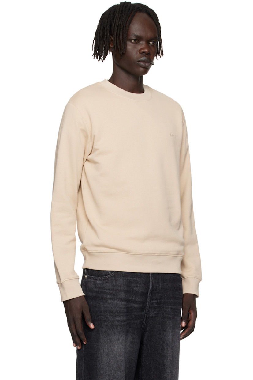 Organic cotton French terry sweatshirt.

· GOTS-certified organic cotton
· Rib-knit crewneck, hem, and cuffs
· Logo embroidered at chest

Supplier color: Beige