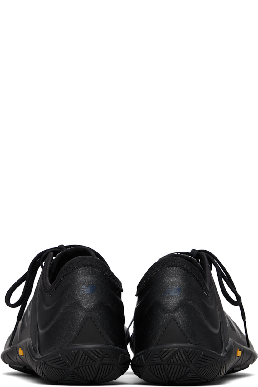 Low-top mesh and buffed faux-leather sneakers in black.

· Bonded trim throughout
· Offset lace-up closure
· Logo patch at tongue
· Logo printed at outer side and heel tab
· Treaded Vibram® rubber sole

Part of the Junya Watanabe x New Balance collaboration.

Supplier color: Black