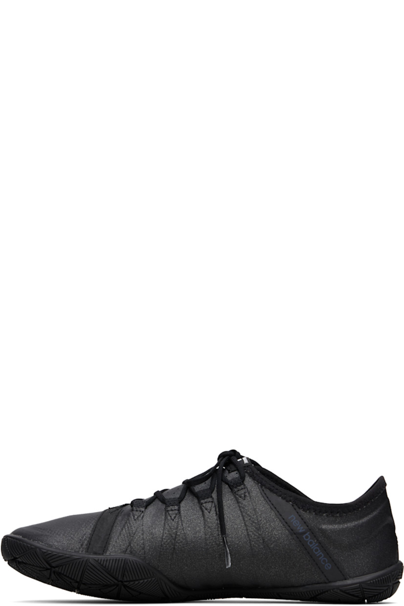 Low-top mesh and buffed faux-leather sneakers in black.

· Bonded trim throughout
· Offset lace-up closure
· Logo patch at tongue
· Logo printed at outer side and heel tab
· Treaded Vibram® rubber sole

Part of the Junya Watanabe x New Balance collaboration.

Supplier color: Black