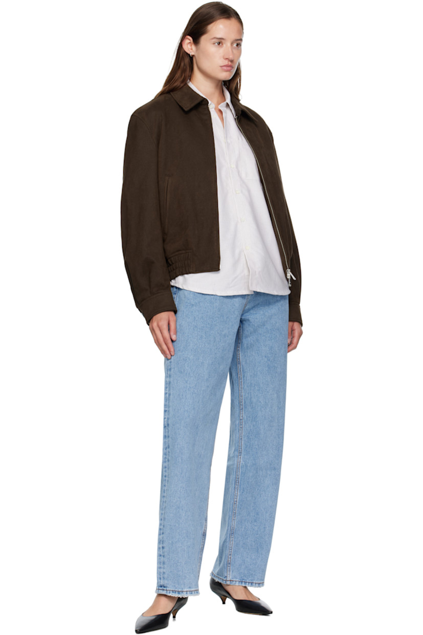 Insulated faux-suede jacket. 

· Button tab at spread collar 
· Two-way zip closure
· Welt pockets at waist 
· Elasticized hem 
· Buttoned barrel cuffs
· Welt pocket at interior 
· Full quilted satin lining 

Supplier color: Dark brown