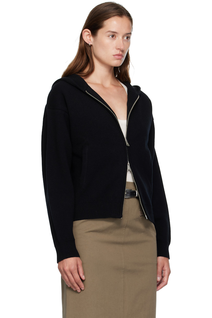 Double-faced knit wool-blend hoodie. 

· Two-way zip closure
· Welt pockets at waist
· Rib-knit hem and cuffs
· Dropped shoulders

Supplier color: Black