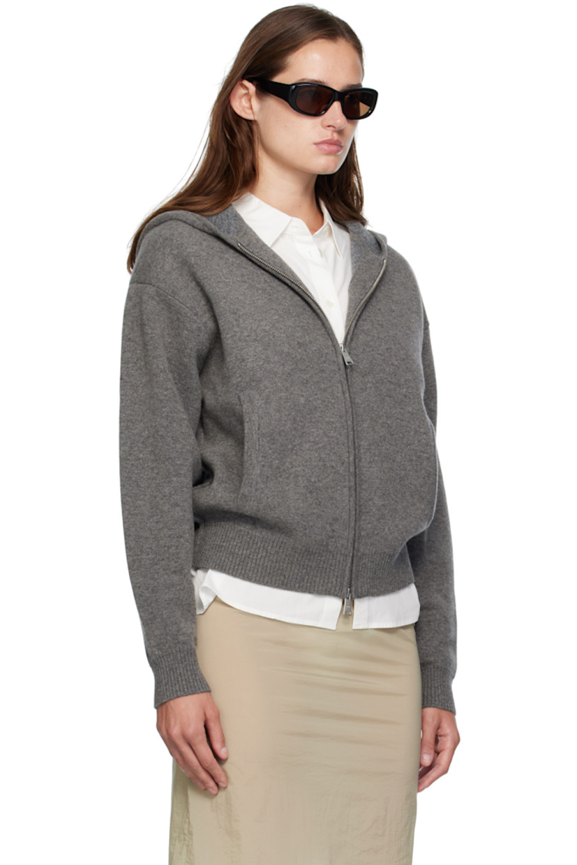 Double-faced knit wool-blend hoodie. 

· Two-way zip closure
· Welt pockets at waist
· Rib-knit hem and cuffs
· Dropped shoulders

Supplier color: Melange charcoal