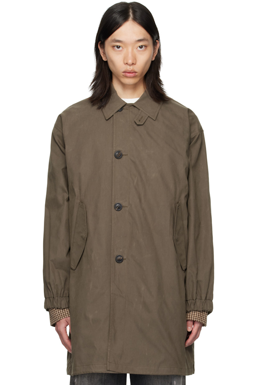 Cotton-blend twill coat.

· Button throat guard at spread collar
· Button closure
· Flap pockets at front
· Adjustable button tab at elasticized cuffs
· Welt pocket and drawstring at interior
· Full satin lining

Supplier color: Khaki