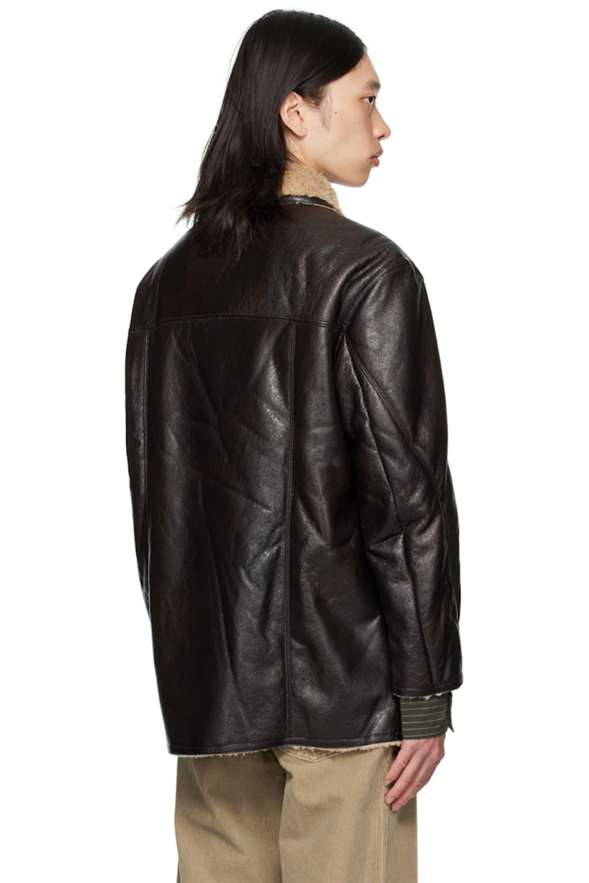 Reversible grained faux-leather coat.

Reverse in beige faux-shearling.

· Spread collar
· Button closure
· Patch pockets at front
· Patch pockets at interior

Supplier color: Dark brown