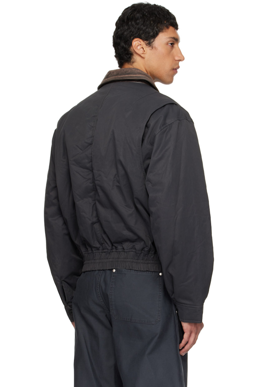 Insulated nylon- and cotton-blend twill jacket.

· Grained lambskin spread collar
· Two-way zip closure
· Flap pockets at front
· Cropped elasticized hem
· Utility pocket at sleeve
· Adjustable buttoned barrel cuffs

Supplier color: Dark grayish green