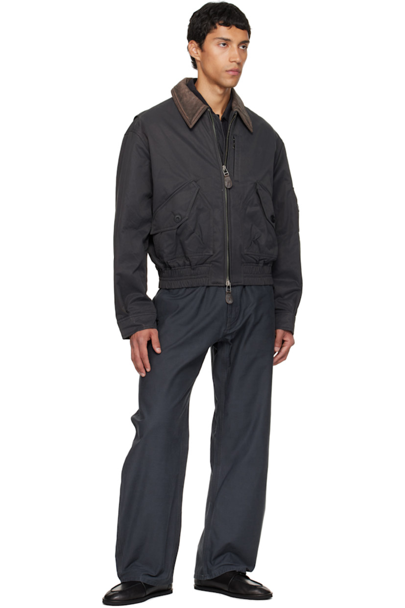 Insulated nylon- and cotton-blend twill jacket.

· Grained lambskin spread collar
· Two-way zip closure
· Flap pockets at front
· Cropped elasticized hem
· Utility pocket at sleeve
· Adjustable buttoned barrel cuffs

Supplier color: Dark grayish green