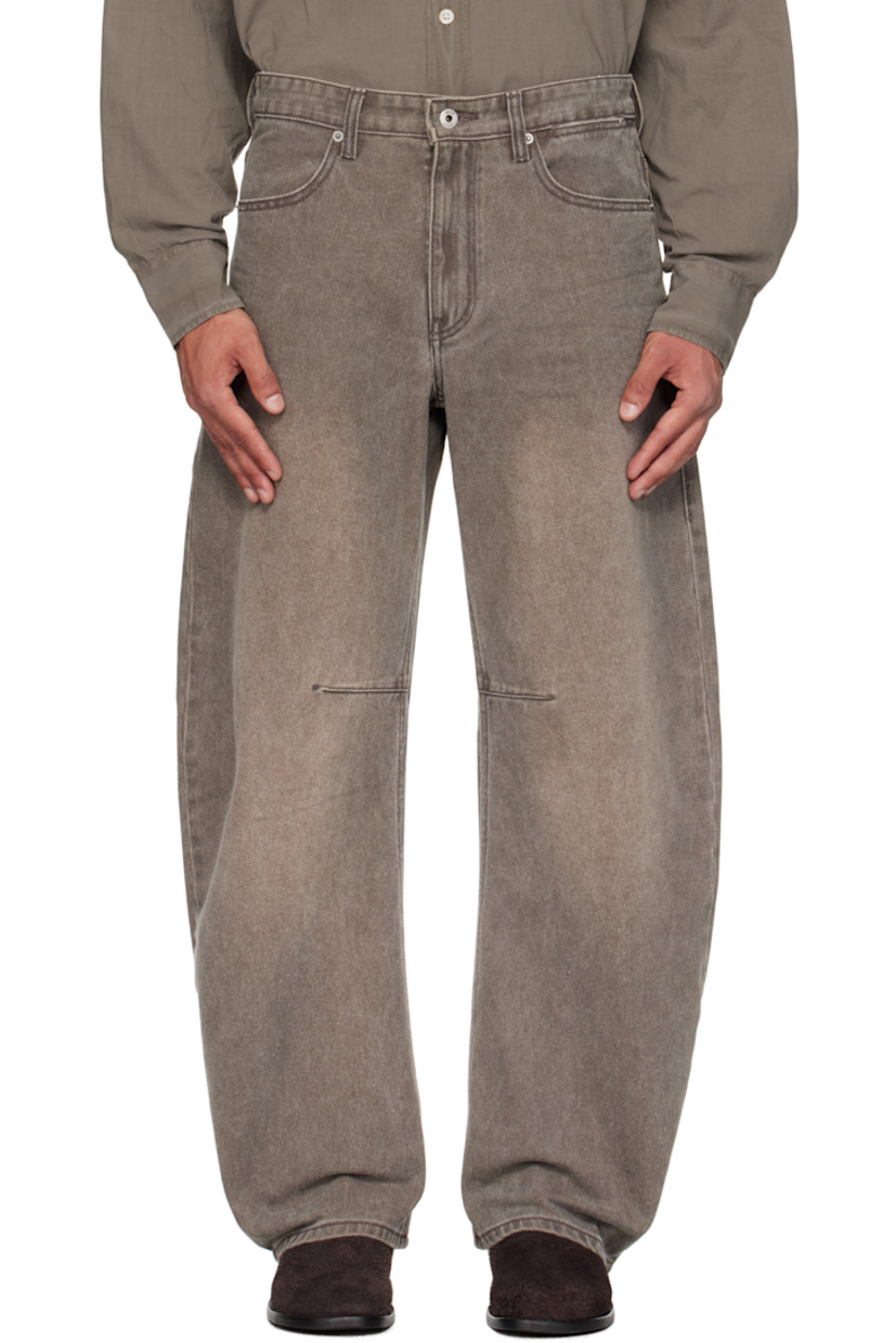 Non-stretch denim jeans.

· Subtle fading throughout
· Belt loops at waistband
· Five-pocket styling
· Zip fly
· Darts at inseam
· Curved legs

Supplier color: Washed brown