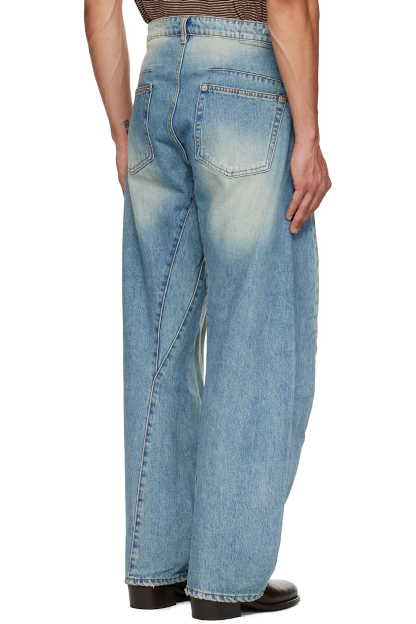 Non-stretch denim jeans.

· Fading and whiskering throughout
· Loose-fit
· Belt loops
· Four-pocket styling
· Zip fly
· Twisted outseams
· Contrast stitching in tan

Supplier color: Washed indigo