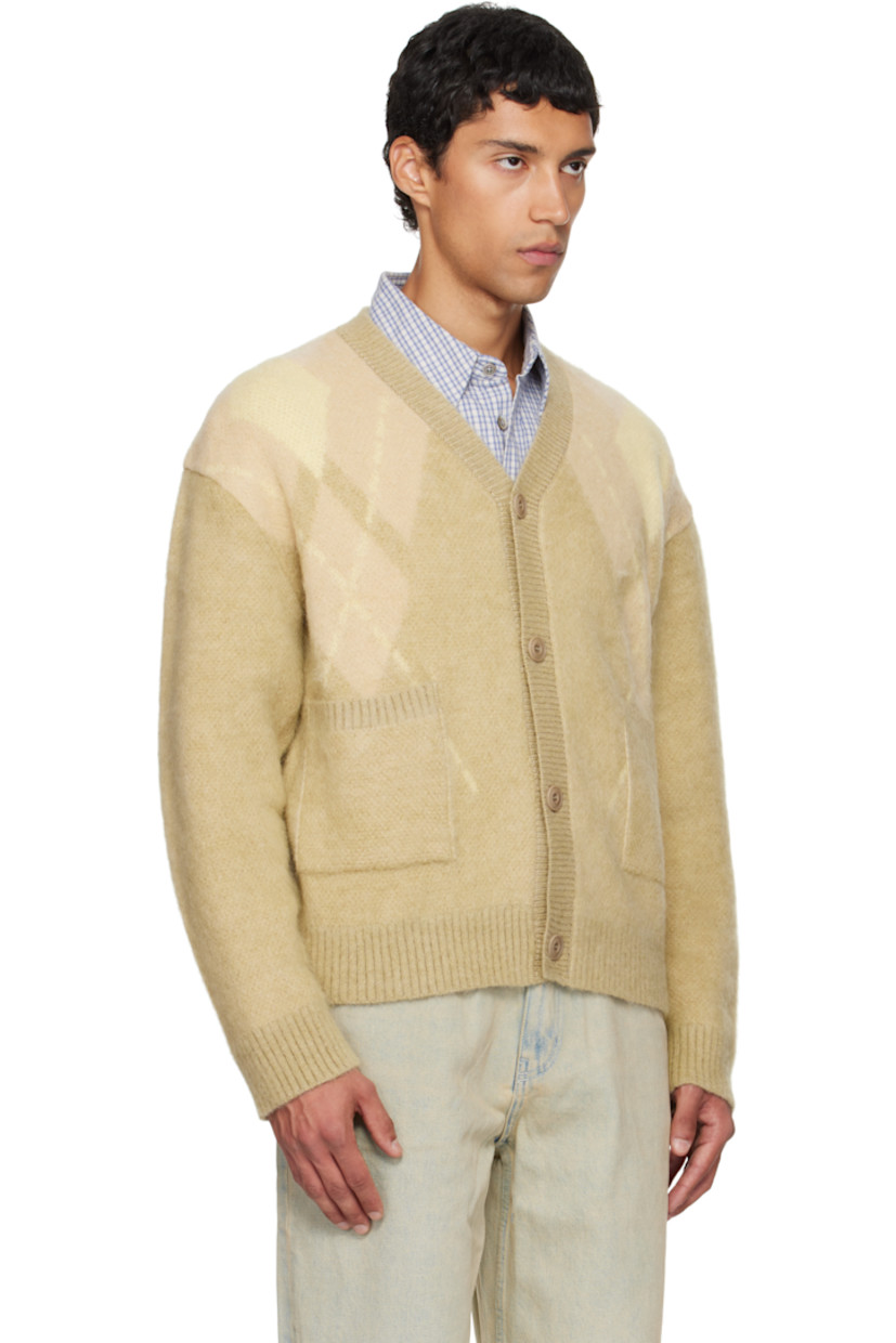 Brushed knit nylon-blend cardigan.

· Argyle pattern throughout
· Rib-knit Y-neck, hem, and cuffs
· Button closure
· Patch pockets at front
· Dropped shoulders

Supplier color: Yellow