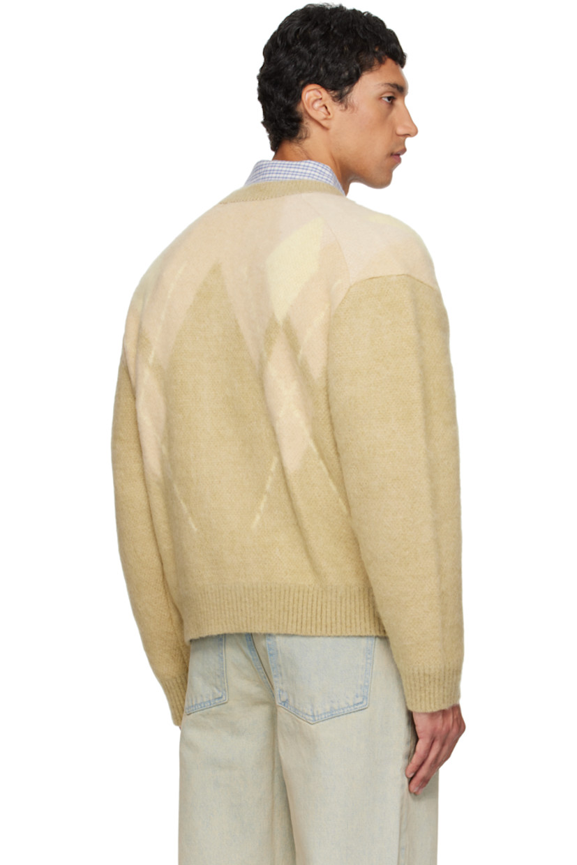 Brushed knit nylon-blend cardigan.

· Argyle pattern throughout
· Rib-knit Y-neck, hem, and cuffs
· Button closure
· Patch pockets at front
· Dropped shoulders

Supplier color: Yellow