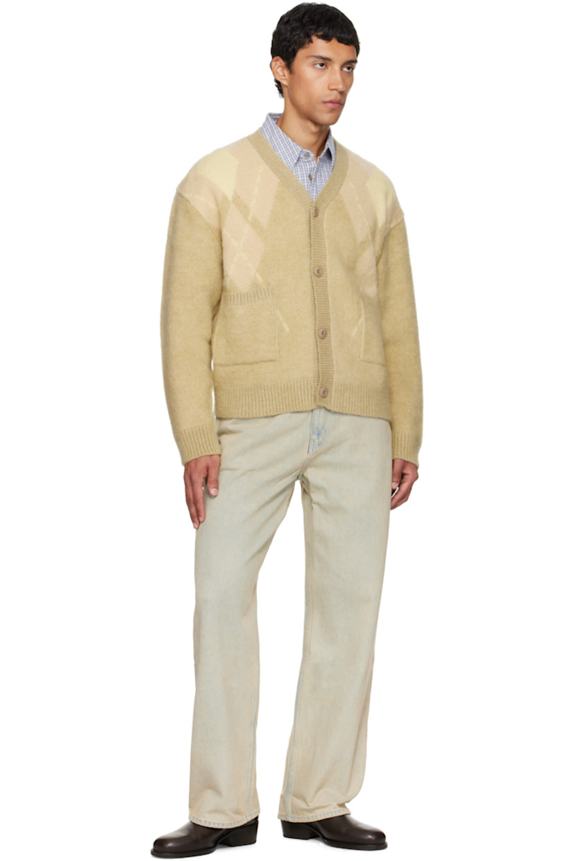 Brushed knit nylon-blend cardigan.

· Argyle pattern throughout
· Rib-knit Y-neck, hem, and cuffs
· Button closure
· Patch pockets at front
· Dropped shoulders

Supplier color: Yellow