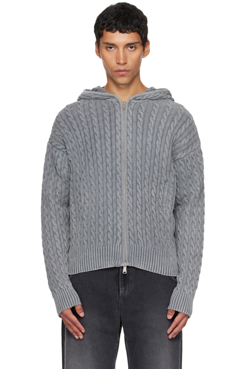 Cable-knit cotton hoodie.

· Garment-dyed
· Two-way zip closure
· Welt pockets at front
· Rib-knit hem and cuffs
· Dropped shoulders

Supplier color: Washed grey