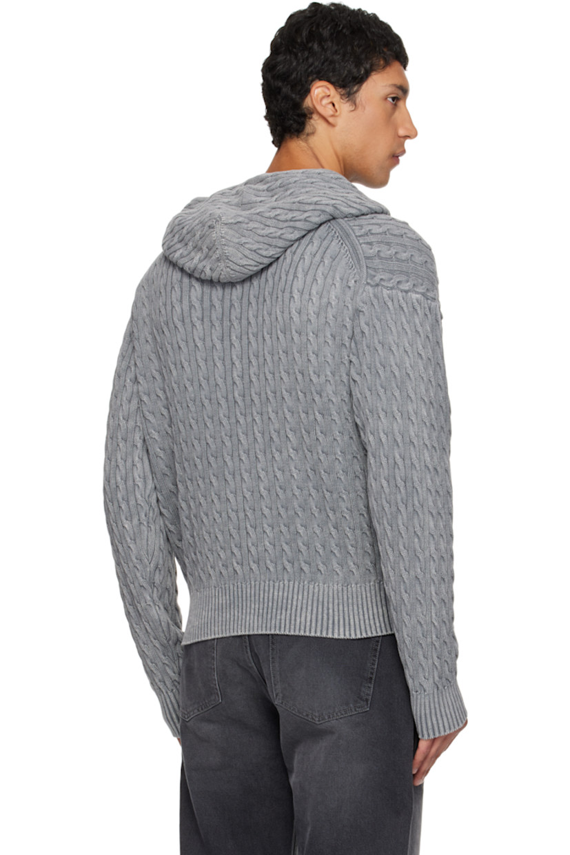 Cable-knit cotton hoodie.

· Garment-dyed
· Two-way zip closure
· Welt pockets at front
· Rib-knit hem and cuffs
· Dropped shoulders

Supplier color: Washed grey