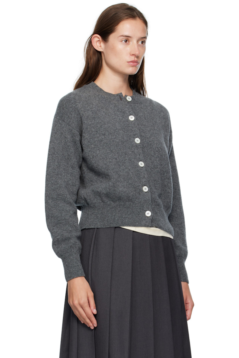 Knit superfine lambswool cardigan.

· Fully fashioned construction
· Rib-knit crewneck, hem, and cuffs
· Button closure
· Dropped shoulders
· Trochus shell hardware

Supplier color: Derby grey