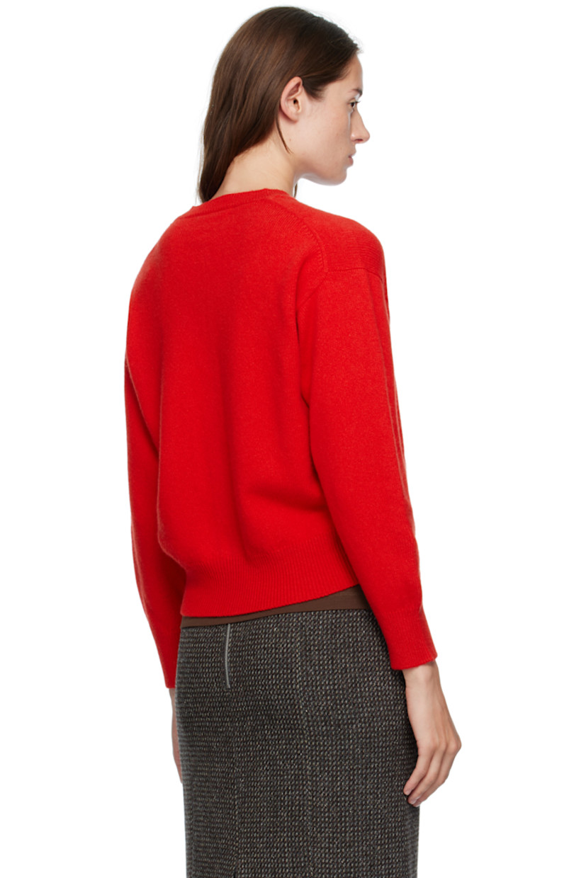 Handcrafted knit Geelong lambswool cardigan. 

· Rib-knit crewneck, hem, and cuffs
· Button closure
· Dropped shoulders

Supplier color: Poppy red