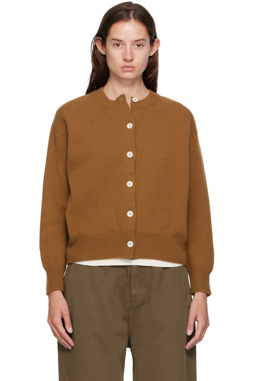 Knit lambswool cardigan.

· Fully fashioned construction
· Rib-knit crewneck, hem, and cuffs
· Button closure
· Dropped shoulders
· Trochus shell hardware

Supplier color: Cinnamon