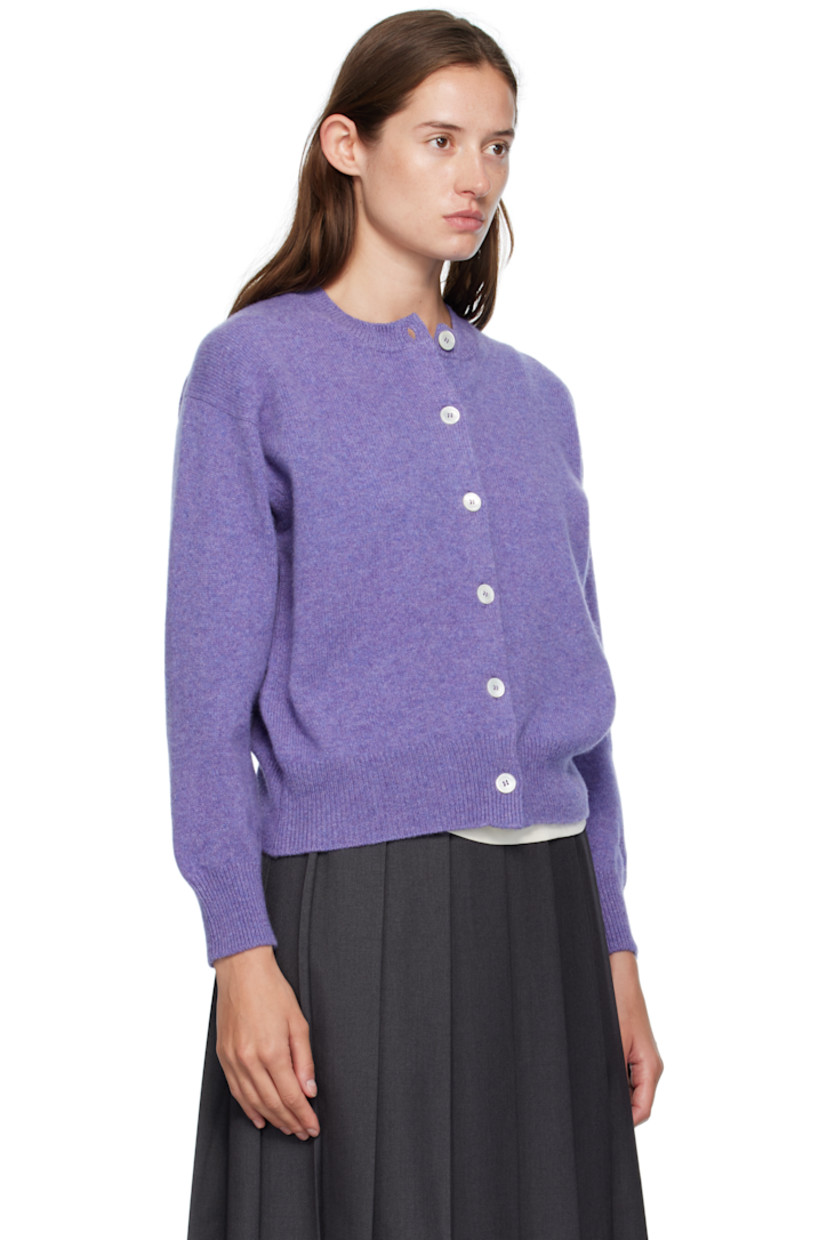 Knit lambswool cardigan.

· Fully fashioned construction
· Rib-knit crewneck, hem, and cuffs
· Button closure
· Dropped shoulders
· Trochus shell hardware

Supplier color: Heather