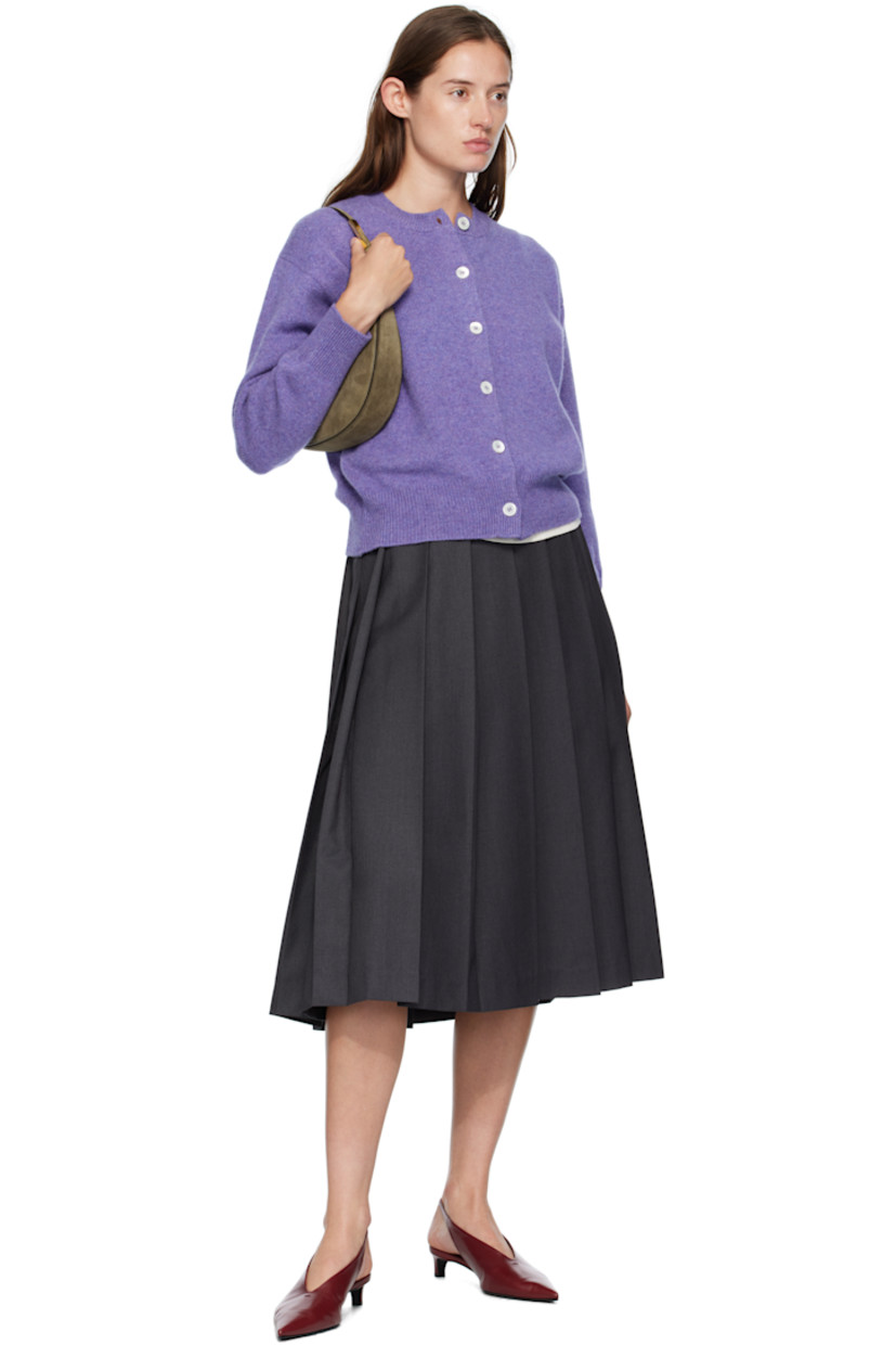 Knit lambswool cardigan.

· Fully fashioned construction
· Rib-knit crewneck, hem, and cuffs
· Button closure
· Dropped shoulders
· Trochus shell hardware

Supplier color: Heather
