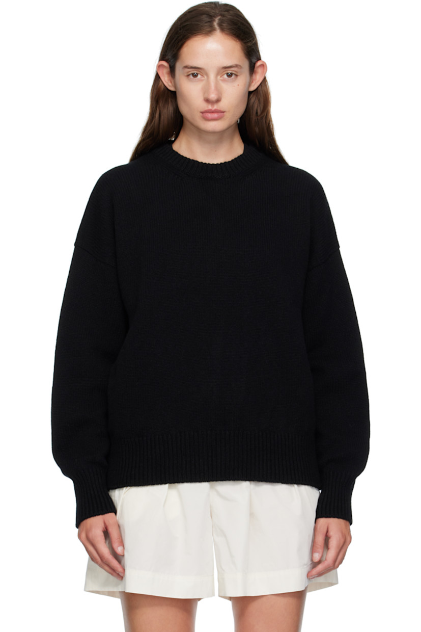 Knit virgin wool sweater.

· RWS-certified virgin wool
· Fully fashioned construction
· Rib-knit crewneck, hem, and cuffs
· Dropped shoulders

Supplier color: Black