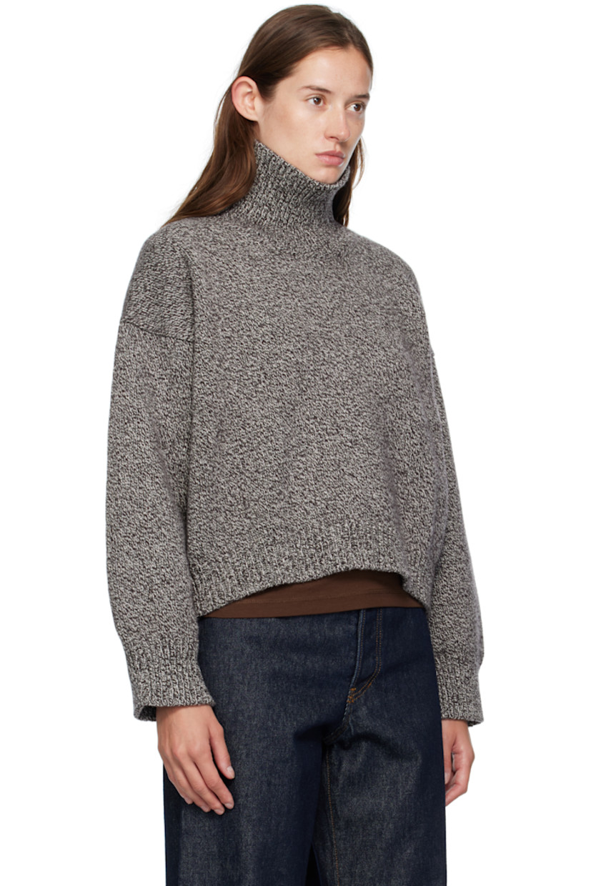 Knit superfine lambswool turtleneck.

· Fully fashioned construction
· Marling throughout
· Rib-knit collar, hem, and cuffs
· Cropped hem
· Dropped shoulders

Supplier color: Dark brown marle