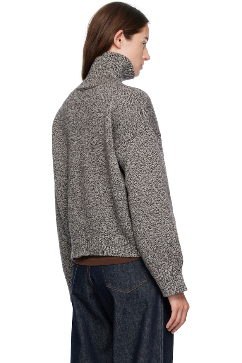 Knit superfine lambswool turtleneck.

· Fully fashioned construction
· Marling throughout
· Rib-knit collar, hem, and cuffs
· Cropped hem
· Dropped shoulders

Supplier color: Dark brown marle