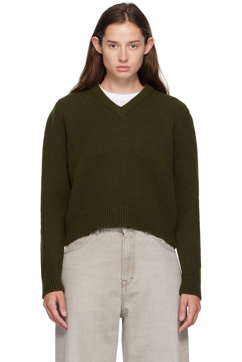 Handcrafted knit Geelong lambswool sweater. Rib-knit V-neck, hem, and cuffs.

Supplier color: Military green