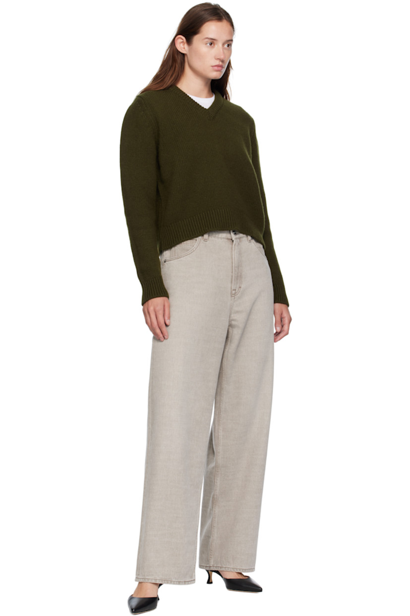 Handcrafted knit Geelong lambswool sweater. Rib-knit V-neck, hem, and cuffs.

Supplier color: Military green