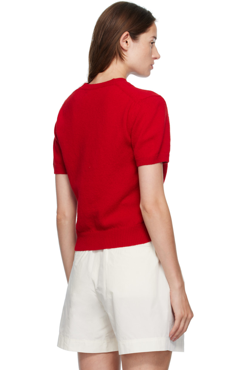 Knit superfine lambswool T-shirt.

· Fully fashioned construction
· Rib-knit crewneck, hem, and cuffs
· Cropped hem

Supplier color: Ruby red
