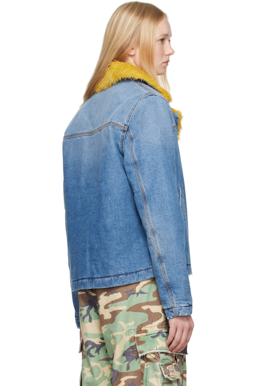 Padded non-stretch denim jacket. Fading throughout.

· Faux-shearling trim at notched lapel
· Button closure
· Welt pockets 
· Full quilted twill lining
· Contrast stitching in tan

Supplier color: Blue