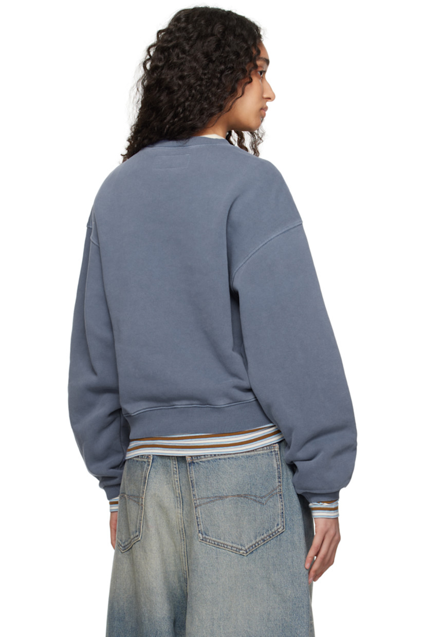 French terry sweatshirt. 

· Rib-knit crewneck, hem, and cuffs
· Embroidered logo patch at chest
· Dropped shoulders

Supplier color: Blue