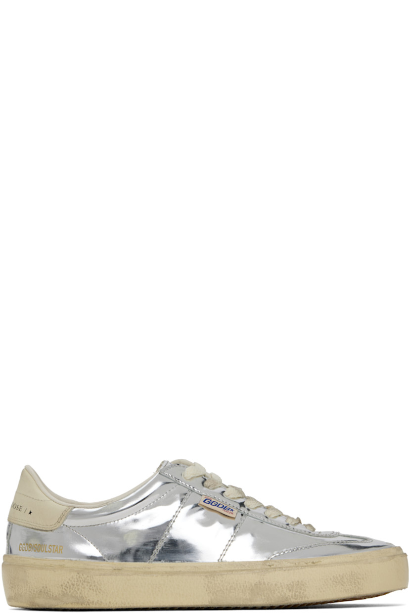 Handcrafted low-top patent leather sneakers in metallic silver tone. 

· Smudging and subtle distressing throughout
· Lace-up closure
· Logo embossed at padded tongue
· Padded collar
· Logo flag and stamp at outer side
· Logo printed at buffed leather heel tab
· Buffed faux-leather and terrycloth lining
· Treaded rubber sole

Supplier color: Silver/Cream