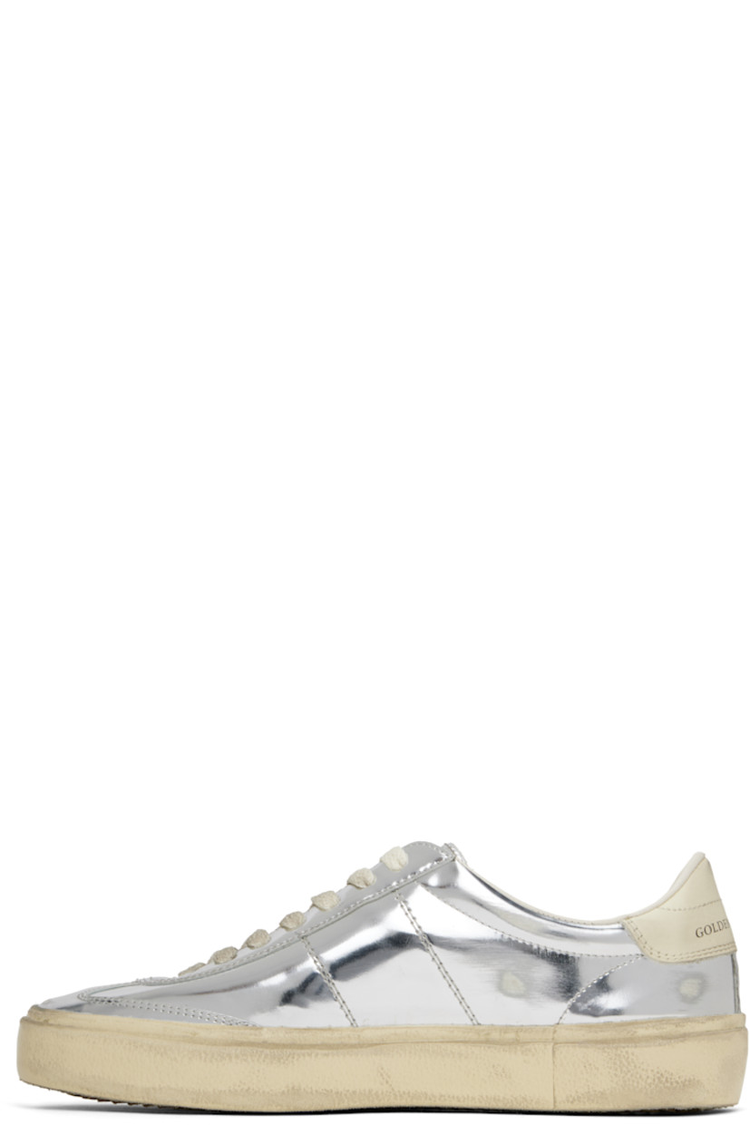Handcrafted low-top patent leather sneakers in metallic silver tone. 

· Smudging and subtle distressing throughout
· Lace-up closure
· Logo embossed at padded tongue
· Padded collar
· Logo flag and stamp at outer side
· Logo printed at buffed leather heel tab
· Buffed faux-leather and terrycloth lining
· Treaded rubber sole

Supplier color: Silver/Cream