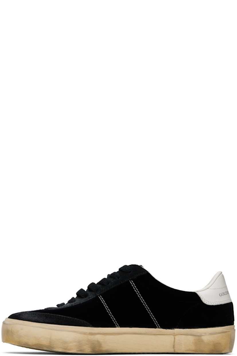 Handcrafted low-top suede and velvet sneakers in black. 

· Smudging and subtle distressing throughout
· Lace-up closure
· Logo embossed at padded tongue
· Padded collar
· Topstitched stripes at sides
· Logo flag and stamp at outer side
· Logo printed at buffed leather heel tab
· Buffed faux-leather and terrycloth lining
· Treaded rubber sole

Supplier color: Black